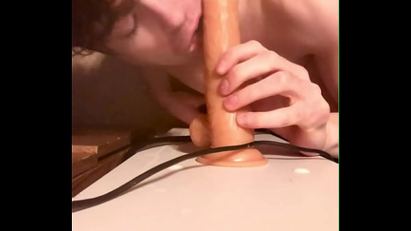 Cock-loving twink Niko Springs devours giant dildo